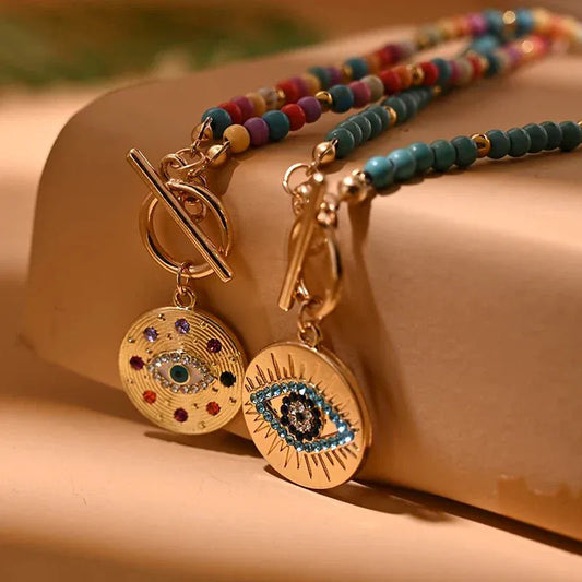 Close-up of 4mm colorful beads and evil eye pendant