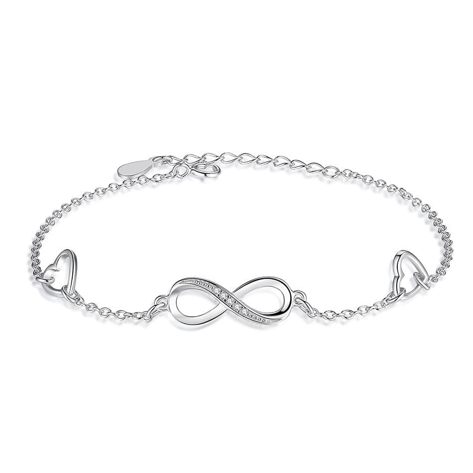 Infinity charm bracelet with soft lighting, romantic jewelry accessory