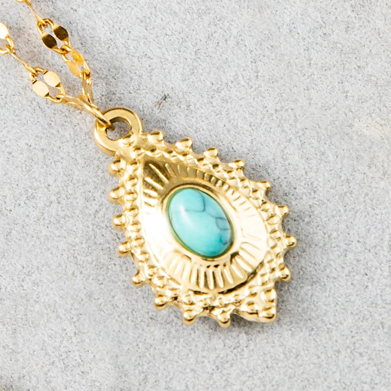 Elegant gold plated cross necklace with evil eye charm for protection